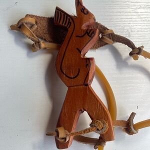 Hand Crafted Wooden Animal Slingshot Toy in Brown and Tan